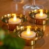 3 theelichtjes van dorsetto in houder op tafel