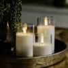 DORSETTO oplaadbare led kaarsen set. Zachte witte uitstraling in glas. Op tafel met dienblad en takjes. Brandtijd 105 uur.
